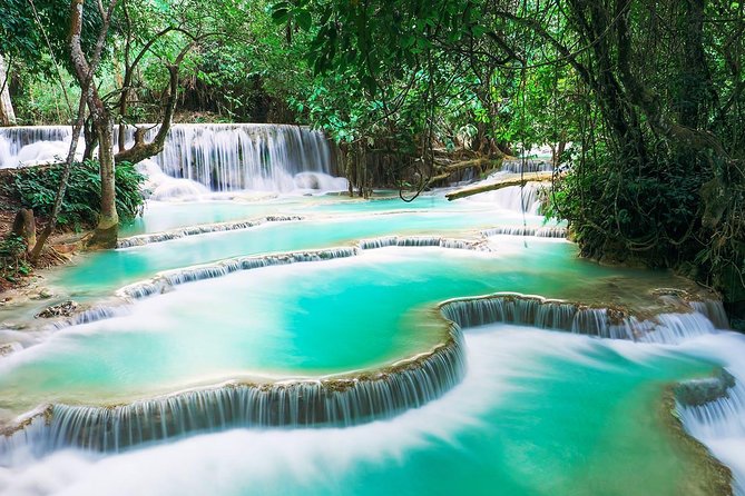 1 DAY Mekong Cruise to Pak Ou Caves. Kuang Si Waterfalls . Local Villages - Discovering the Majestic Kuang Si Waterfalls