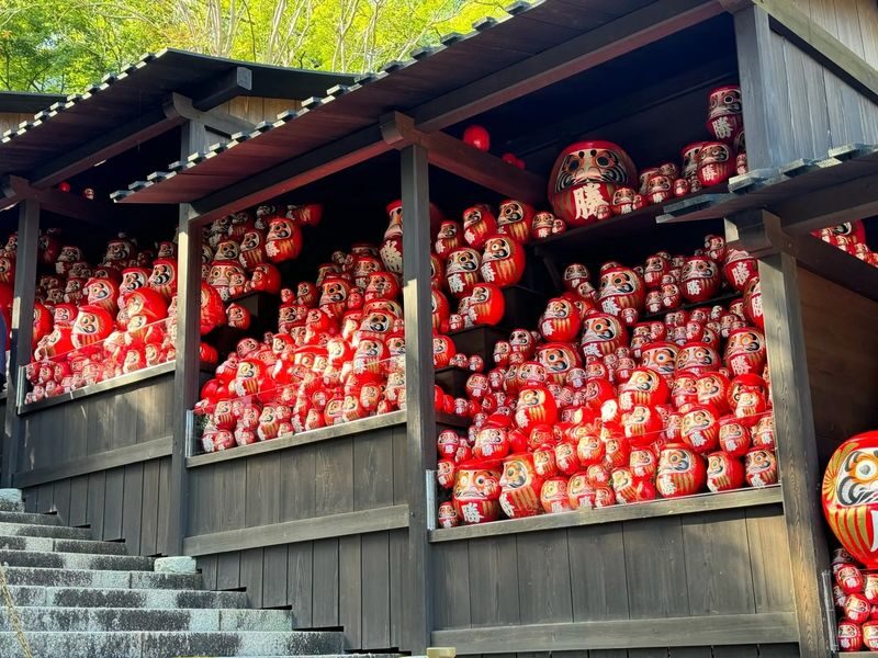 1-Day Osaka Tour: Discover Daruma Magic and the Beautiful Minoh Fall - Finding the Daruma stories at Katsuoji