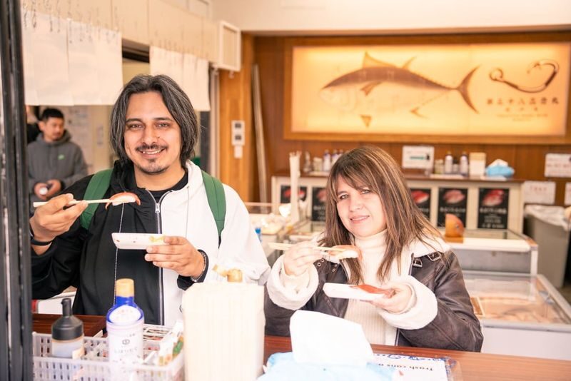 1-Day Tokyo Highlights Tour with a Private Car and Guide - Tsukiji is the day’s first food stop