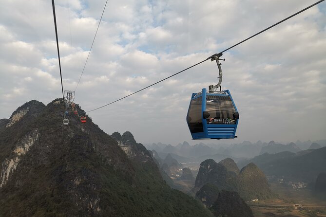 1-Day Yangshuo Yulong Bamboo Boat and Ruyi Peak Cable Car From Xingping Hotel - Tour Overview