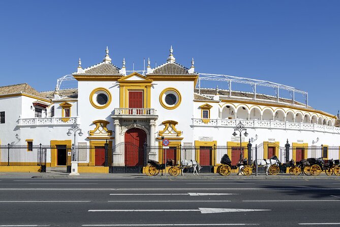 2-Day Seville Tour From Granada With Royal Alcazar Palace, Seville Cathedral and Flamenco Show - Evening Walking Tour and River Cruise