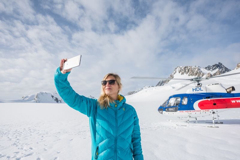 25 Minute Glacier Helicopter Flight with Snow Landing - Stepping out onto the snow