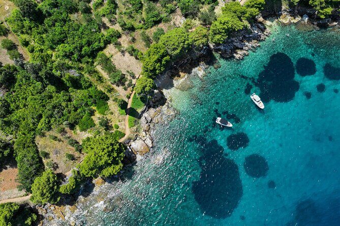 3 Island Tour Swim and Snorkel with Drinks on Traditional Boat - First Stop: Oljak – Croatia’s Tiniest Inhabited Island