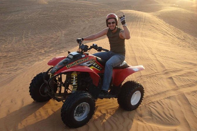 30 Mins Quad Bike, Desert Safari With BBQ Dinner and Camel Ride in Dubai - The Sum Up