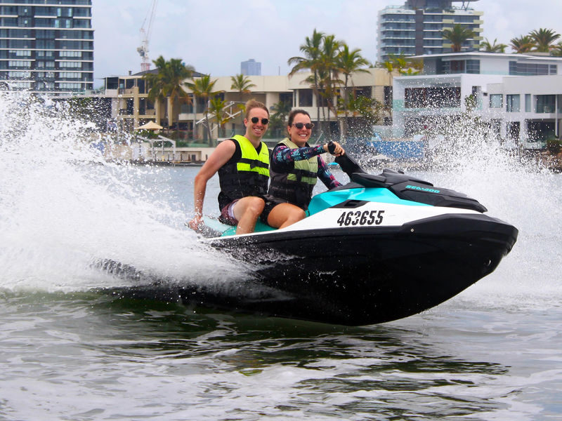 30-Minute River Rush Odyssey Jet Ski Tour - Past waterfront homes and the city skyline