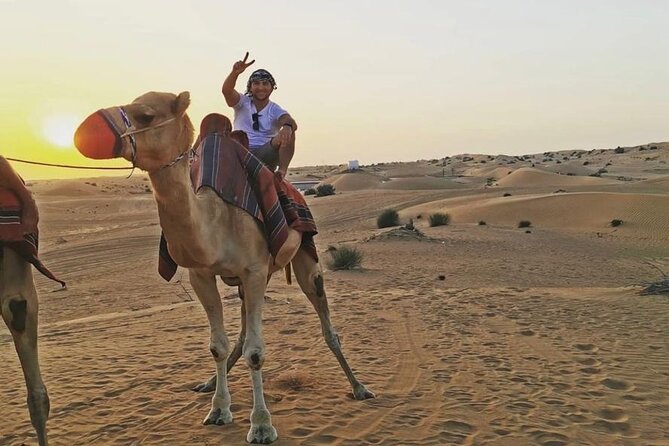 4WD Red Dune Desert Safari With Camelride, Sandboarding & More - Cancellation Policy