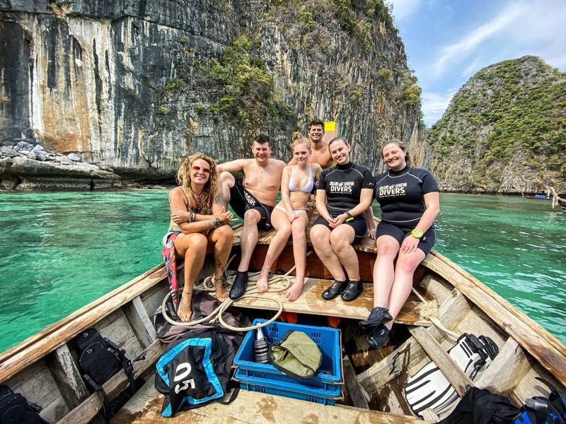 5 Dives Delight: Koh Phi Phis Underwater Secret with PADI 5</em> center – Starting early and sorting the gear’ /></p>
<p><p>The day is scheduled to depart at 7:30 am. Before the activity, you gear up at the center’s office; on the day itself, the equipment is set out on the pier-side boat. That split arrangement is useful to know: it gives you a chance to get fitted before departure, while keeping the actual morning routine focused on getting aboard.</p>
</p>
<p><p>At the pier, you collect tickets and board a custom boat. Divemasters lead the briefings and help with gear preparation. This is not a lesson for beginners: you must already hold an Open Water certification, and you are expected to be medically fit to take part. There is no minimum logged-session count, but you must have recent scuba experience.</p>
</p>
<p><p>Groups are capped at four participants per guide, a detail worth weighing if you prefer individual attention or feel rusty. A refresher upgrade is available for US$30. If you have not been underwater recently, it is sensible to consider the upgrade rather than treating the absence of a logged-session minimum as proof that no recent practice is needed.</p>
</p>
<p><p>The stated meeting point is PQVF+MQ9 in Ao Nang, Krabi. At the same time, the participation information says you must be staying on Koh Phi Phi. Those details do not neatly line up, so contact the operator before booking to confirm where you need to sleep and where you need to meet. Do not assume transport between Ao Nang and Phi Phi is included; it is not listed among the inclusions.</p>
</p>
<div style="margin: 20px 0; padding: 15px 0;"><p>You can also read our reviews of more tours and experiences in Krabi.</p><ul style="margin: 10px 0; padding: 0; list-style: none;"><li style="margin: 0 0 10px 0; padding: 0 0 10px 0; border-bottom: 1px solid #eee; display: flex; align-items: flex-start; gap: 12px; line-height: 1.4;"><a href="https://veronikasadventure.com/krabi-hong-islands-day-trip-by-speedboat-with-lunch/" aria-hidden="true" tabindex="-1"><img decoding="async" style="width: 80px; height: 60px; object-fit: cover; border-radius: 4px; flex-shrink: 0;" src="https://veronikasadventure.com/wp-content/uploads/krabi-hong-islands-day-trip-by-speedboat-with-lunch-150x150.jpg" alt="" loading="lazy"></a><div><a href="https://veronikasadventure.com/krabi-hong-islands-day-trip-by-speedboat-with-lunch/">Krabi: Hong Islands Day Trip by Speedboat With Lunch</a><br><span style="font-size: 0.82em; color: #555; margin-top: 2px;"><span style="color: #f5a623;">★</span> 4.5 · 3,952 reviews</span></div></li><li style="margin: 0 0 10px 0; padding: 0 0 10px 0; border-bottom: 1px solid #eee; display: flex; align-items: flex-start; gap: 12px; line-height: 1.4;"><a href="https://veronikasadventure.com/krabi-tiger-cave-temple-emerald-pool-and-hot-springs-tour/" aria-hidden="true" tabindex="-1"><img decoding="async" style="width: 80px; height: 60px; object-fit: cover; border-radius: 4px; flex-shrink: 0;" src="https://veronikasadventure.com/wp-content/uploads/2025/05/1_krabi-tiger-cave-temple-emerald-pool-and-hot-springs-tour-150x150.jpg" alt="" loading="lazy"></a><div><a href="https://veronikasadventure.com/krabi-tiger-cave-temple-emerald-pool-and-hot-springs-tour/">Krabi: Tiger Cave Temple, Emerald Pool and Hot Springs Tour</a><br><span style="font-size: 0.82em; color: #555; margin-top: 2px;"><span style="color: #f5a623;">★</span> 4.8 · 3,616 reviews</span></div></li><li style="margin: 0; padding: 0; border-bottom: none; display: flex; align-items: flex-start; gap: 12px; line-height: 1.4;"><a href="https://veronikasadventure.com/from-krabi-phi-phi-islands-speedboat-day-tour/" aria-hidden="true" tabindex="-1"><img decoding="async" style="width: 80px; height: 60px; object-fit: cover; border-radius: 4px; flex-shrink: 0;" src="https://veronikasadventure.com/wp-content/uploads/2024/01/from-krabi-phi-phi-islands-speedboat-day-tour-150x150.jpg" alt="" loading="lazy"></a><div><a href="https://veronikasadventure.com/from-krabi-phi-phi-islands-speedboat-day-tour/">From Krabi: Phi Phi Islands Speedboat Day Tour</a><br><span style="font-size: 0.82em; color: #555; margin-top: 2px;"><span style="color: #f5a623;">★</span> 4.3 · 3,340 reviews</span></div></li></ul></div><h2 id="section-2">Reefs and walls around Koh Phi Phi</h2>
<p><img src=