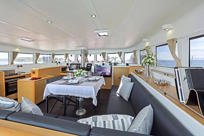 5 Hour Private Day or Sunset Cruise in Large & Majestic Catamaran - Price, Booking, and Guarantee Information
