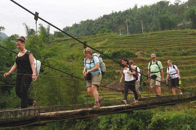 8 Days Trekking Through Hoang Lien National Park to Lao Cai - Black Hmong Porters: Lightening the Load