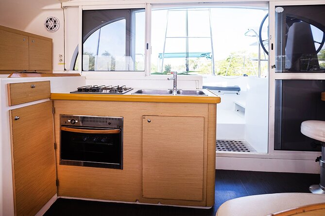 8-Hour Private 38 Catamaran 2-Stop Tour to Cozumel With Food,Open Bar & Snorkel - The Sum Up