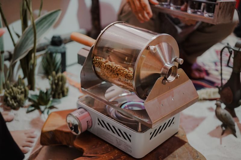 A Coffee Experience at The Sundowner - Roast, Grind & Brew - Grinding the beans the old-school way