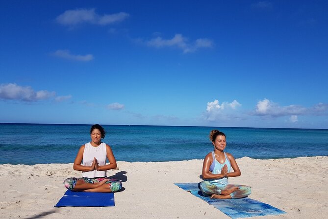 A Small-Group, Morning or Sunset Yoga Class on the Beach  - Aruba - Cancellation Policy