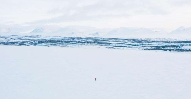 Abisko: Lake Torneträsk Arctic Ice Fishing Trip - Small Group Experience and Pickup
