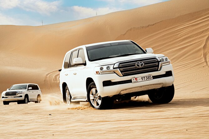 Abu Dhabi Desert Exclusive BBQ Dinner, Dune Bashing & Sunset - Indulge in a Delicious BBQ Dinner