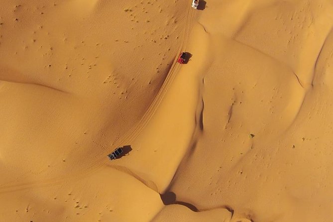 Abu Dhabi Desert Safari 4x4 Dune Bashing & Camel Riding & Sand Boarding With BBQ - Immerse Yourself in Authentic Emirati Experiences