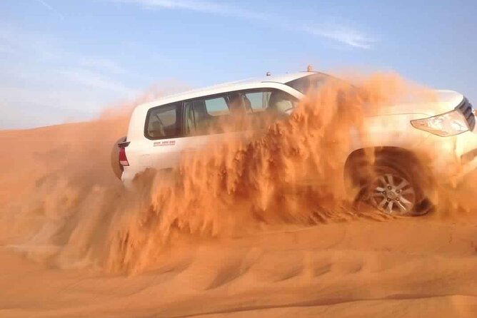 Abu Dhabi Desert Safari Dune Bashing,Came,Belly Dance & BBQ - Experience the Thrill of Dune Bashing