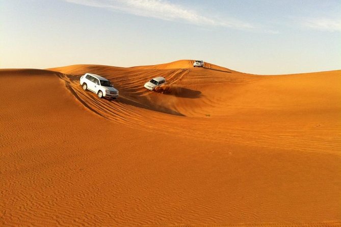 Abu Dhabi Desert Safari With BBQ Dinner , Camel Ride , Bally Dance - Indulge in a Delicious BBQ Dinner