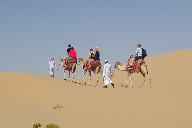 Abu Dhabi Desert Safari With BBQ Dinner,Sandboarding & Camel Ride - BBQ Dinner