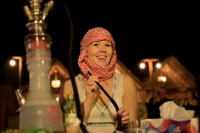 Abu Dhabi Evening Desert Safari With Camel Ride and Dinner - The Sum Up
