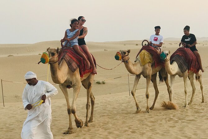 Abu Dhabi Morning Desert Safari,Dune Bashing,Sandboarding,Camel Riding&Quad Bike - Cultural Experience: Camel Riding