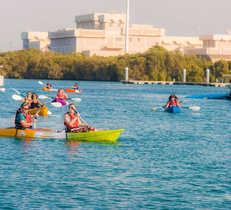Abu Dhabi Reem Central Park Half-Day Kayaking Tour - A park paddle with a skyline backdrop