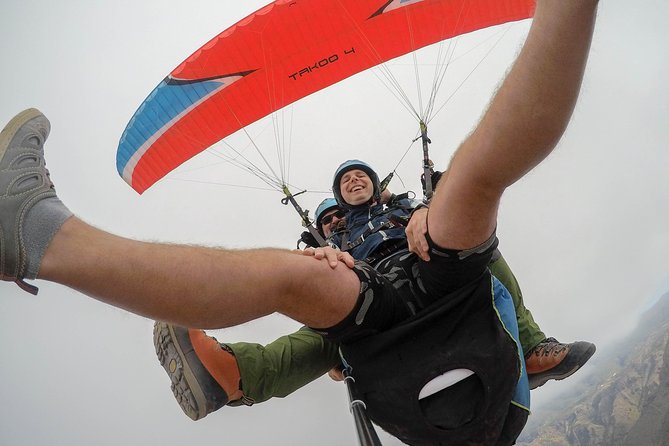 Acrobatic Paragliding Tandem Flight in Tenerife South - Common Questions