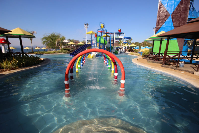 Adventure Beach Waterpark Ticket in Subic - A pool day with a beach at the edge