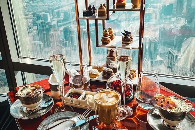 After Noon High Tea at At.Mosphere Burj Khalifa With Transfer - Confirmation and Accessibility