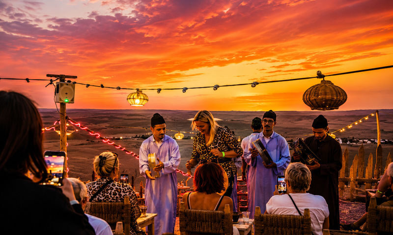 Agafay Desert Dinner, Camel Ride, Traditional Music & Fire Show - Dinner at camp: Moroccan staples, not a menu tour