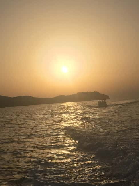 Agia Pelagia: Sunset Motorboat Tour with Soft Drinks - Introduction to the Experience