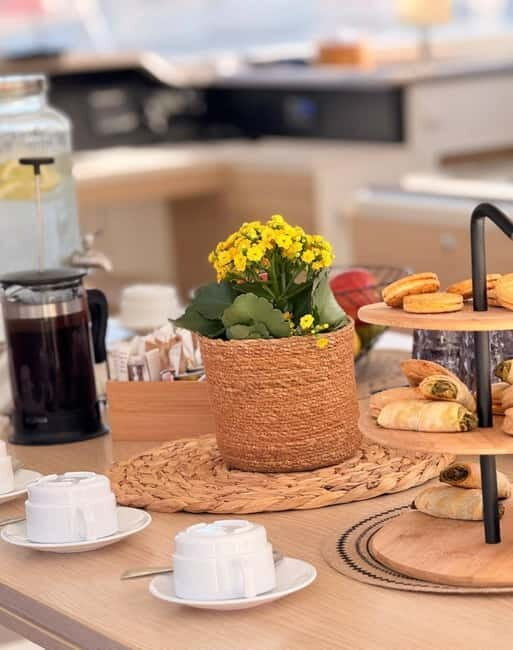 Agios Nikolaos: Catamaran to Spinalonga + Dinner & Transfer - Itinerary Breakdown