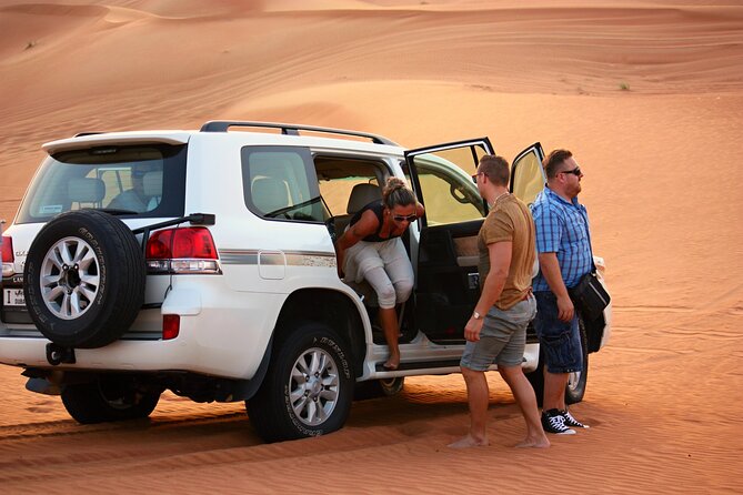 Al Madam Ghost Village & Camel Rock Safari - Traditional Desert Activities: Camel Riding, Sand Buggy Riding, Sandboarding, ATV Biking