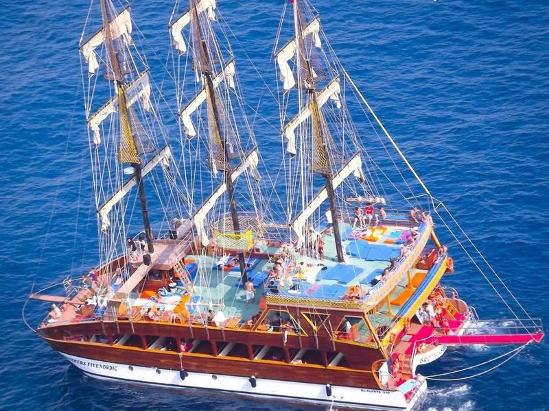 Alanya Full-Day Catamaran Tour with Local Food - Pirates Cave, cliffs, and the coastline