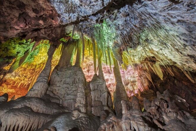 Alcudia: Half-Day Caves of Hams, Blue Caves and Documentary - Itinerary Overview