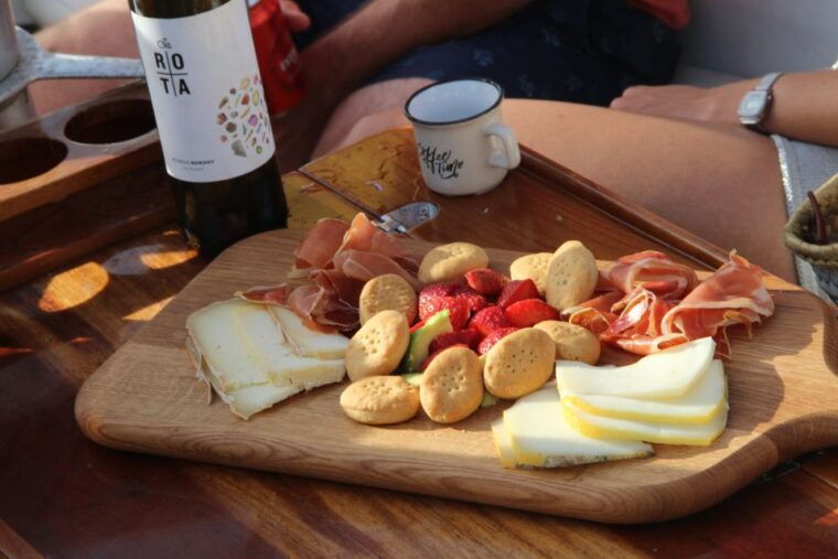 Alcudia: Private Sunset Boat Trip With Glass of Wine & Snack - Aperitif, Wine, and Swimming