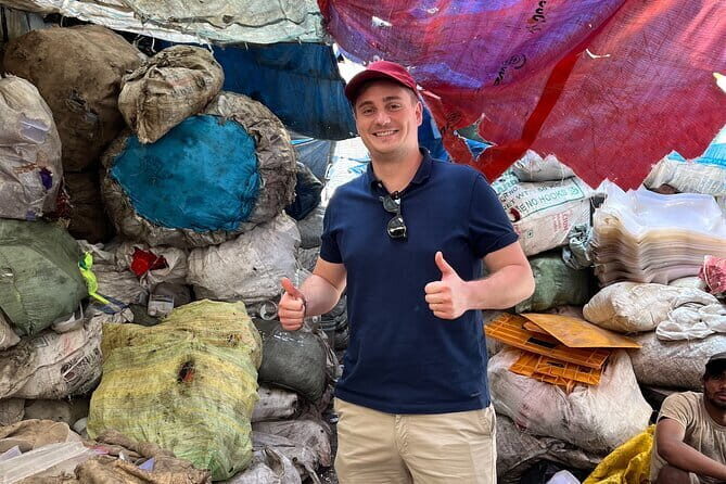 All in One Mumbai City, Slum & Bollywood Tour with Transport - Visiting the Hanging Gardens and Mani Bhavan