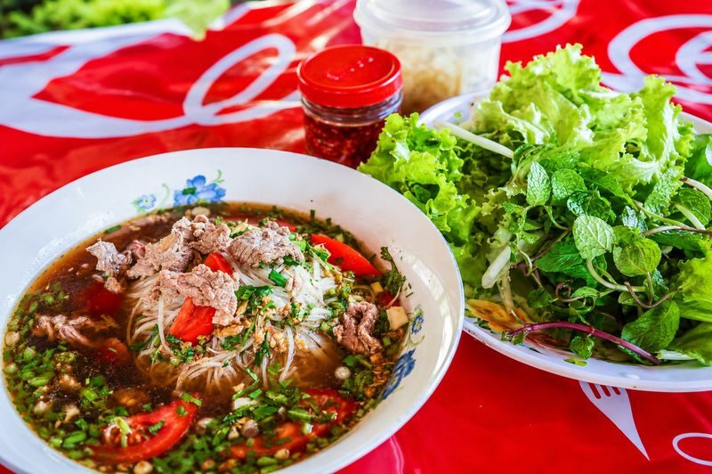 Alms Giving, Morning Market & Local Breakfast Experience - Breakfast beside the Mekong, with a caveat
