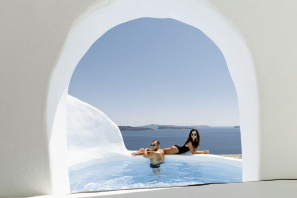 Amazing Private Casual Photoshoot in Santorini - Vibrant Bougainvillea and the Aegean Sea