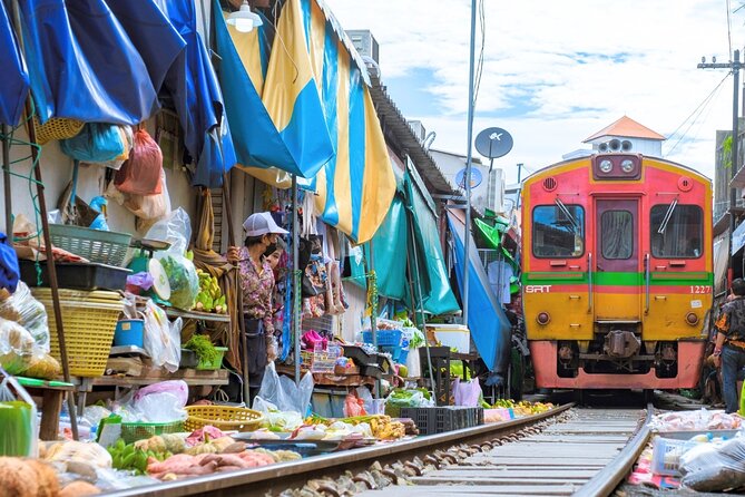 Amphawa Floating Market & Maeklong Railway Train Market Tour - Dress Code and Temple Visit