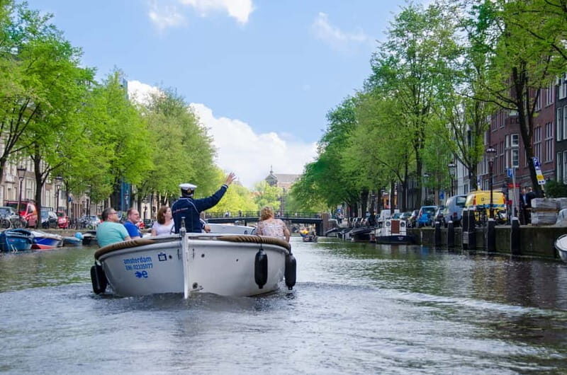 Amsterdam: 75 minute Open Boat Canal Cruise with Live Guide - The Experience in Detail