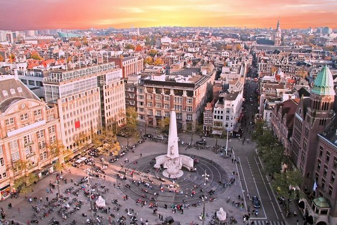 Amsterdam Airport Private Arrival Transfer - Professional Chauffeur With a Welcome Sign