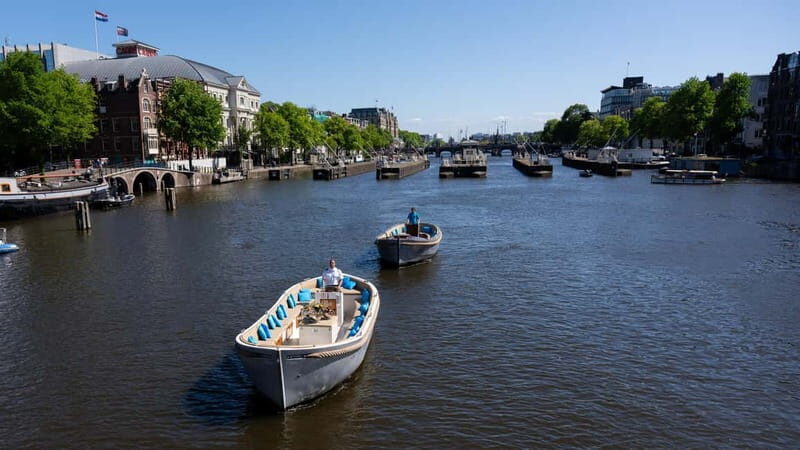 Amsterdam: Canal Cruise in Open Boat with Drink Option - How the Cruise Works: What to Expect