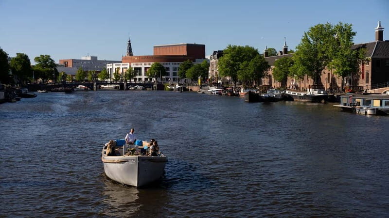 Amsterdam: Canal Cruise in Open Boat with Drink Option - Who Should Book This Tour?