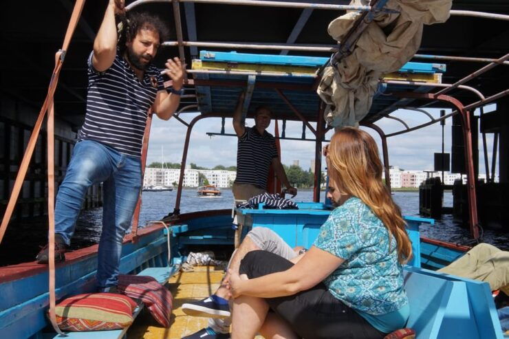 Amsterdam: Canal Cruise on a Wooden Refugee Boat - Guided Storytelling by Refugee Captains