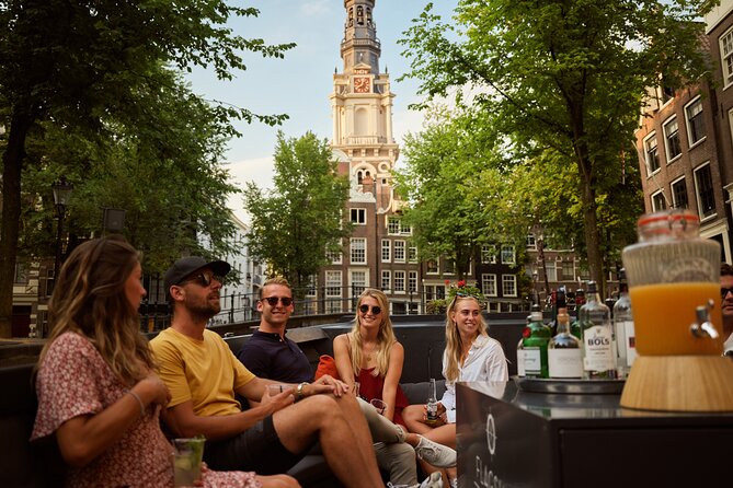 Amsterdam Canal Cruise With Live Guide and Onboard Bar - Meeting and Pickup