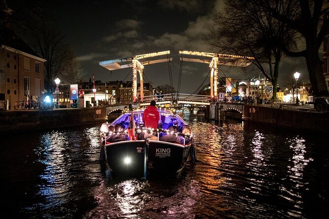 Amsterdam Canal Cruise With Live Guide and Unlimited Drinks - Experience Highlights