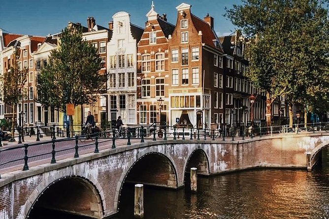 Amsterdam City Center & History - Exclusive Guided Walking Tour - Tour Duration and Languages Offered