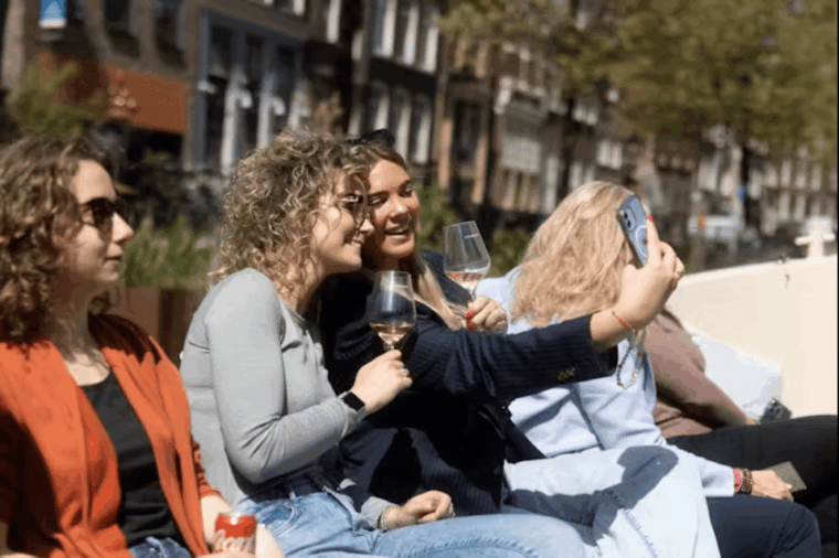 Amsterdam: City Highlights Small Boat Canal Cruise with host - The Sum Up  