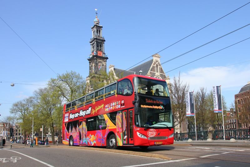 Amsterdam City Sightseeing Bus Pass with Canal Cruise - Audio commentary and onboard comfort