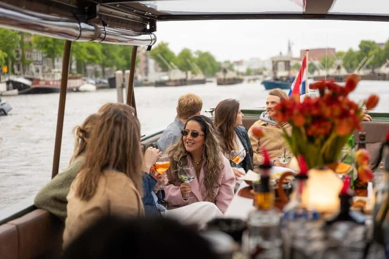 Amsterdam: Covered Canal Cruise with Drinks & Bites - The Experience in Detail